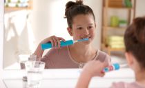 Brosse à dents électrique pour enfants: types, pros, meilleurs modèles